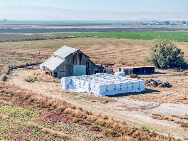 bird's eye view with a mountain view and a rural view