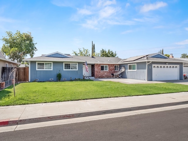 ranch-style home with a garage and a front lawn