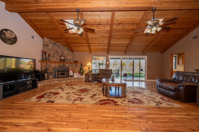 living room featuring high vaulted ceiling, hardwood / wood-style flooring, ceiling fan, beam ceiling, and wood ceiling