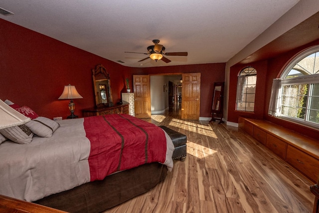 8510 E Nees Ave, Clovis, CA 93619 - bedroom with wood finished floors and ceiling fan