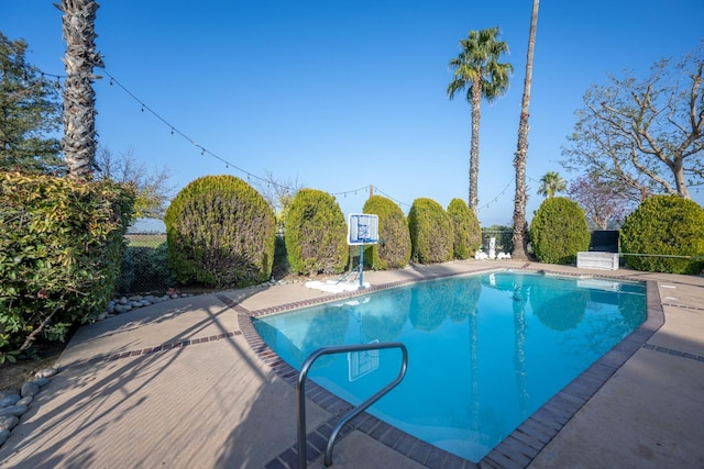 view of pool with a patio