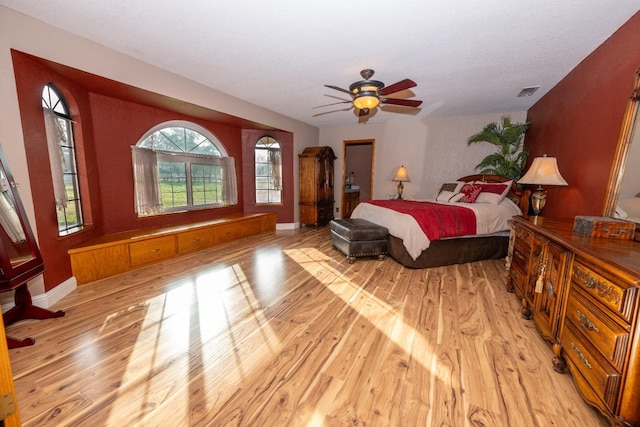 8510 E Nees Ave, Clovis, CA 93619 - bedroom featuring light wood-type flooring, baseboards, and ceiling fan