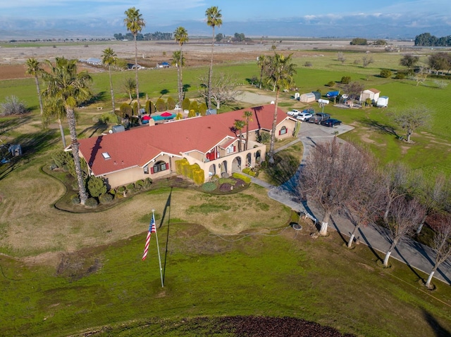 birds eye view of property featuring a rural view