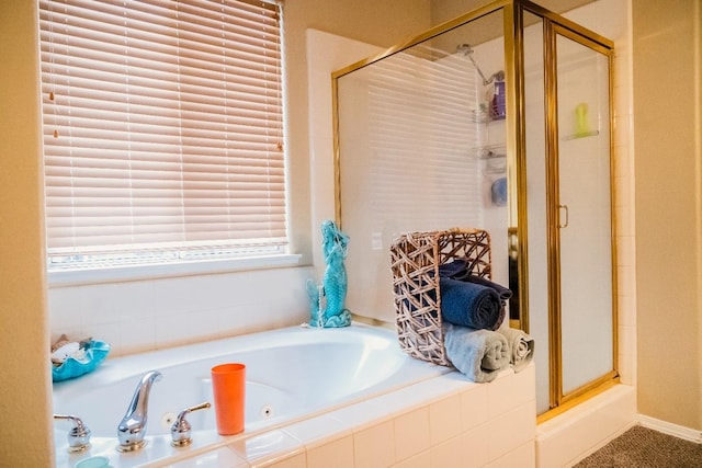 bathroom with independent shower and bath