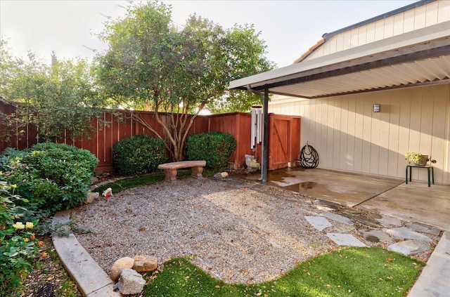 view of yard with a patio area and fence