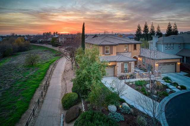 view of front of property with a garage