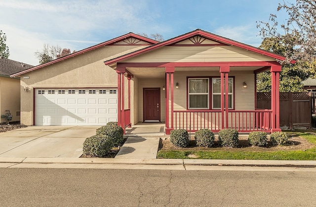 view of front of house featuring a garage and a porch