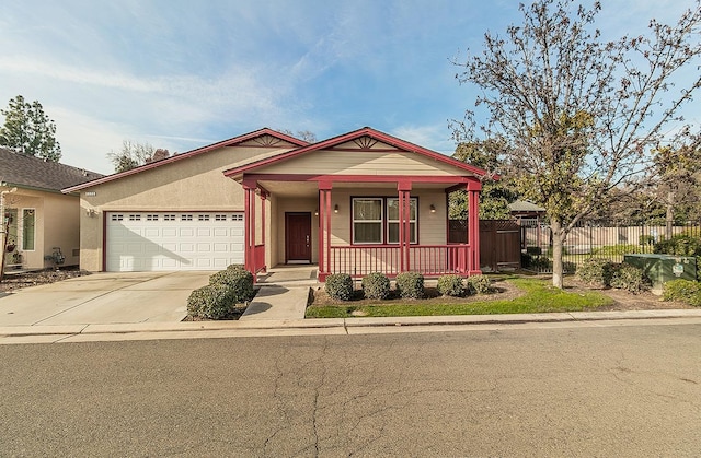 view of front of property featuring a porch and a garage