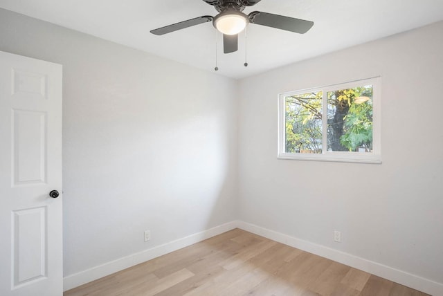 unfurnished room featuring light hardwood / wood-style floors and ceiling fan