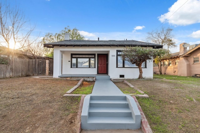 view of front of home with a front lawn