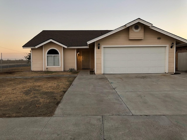 ranch-style house with a garage