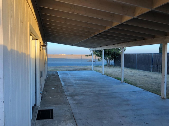 view of patio featuring a water view