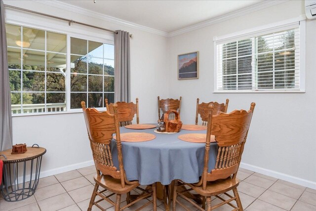 tiled dining room with an AC wall unit and crown molding