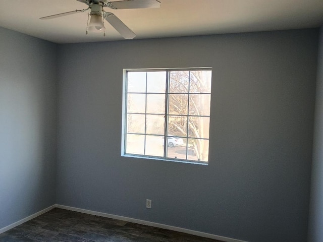 unfurnished room featuring ceiling fan