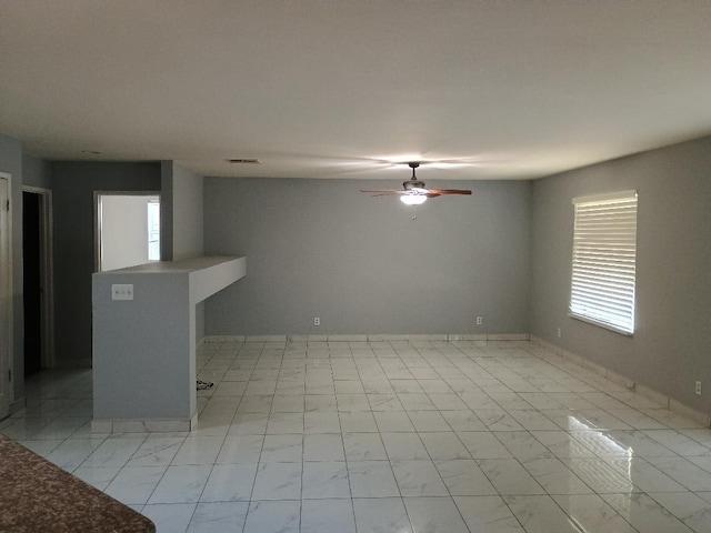 spare room featuring ceiling fan