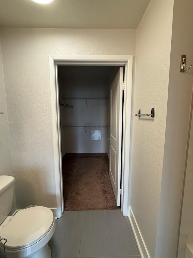 bathroom featuring toilet