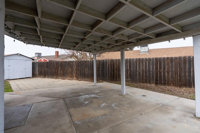 view of patio / terrace with a storage shed