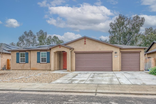 ranch-style home featuring a garage