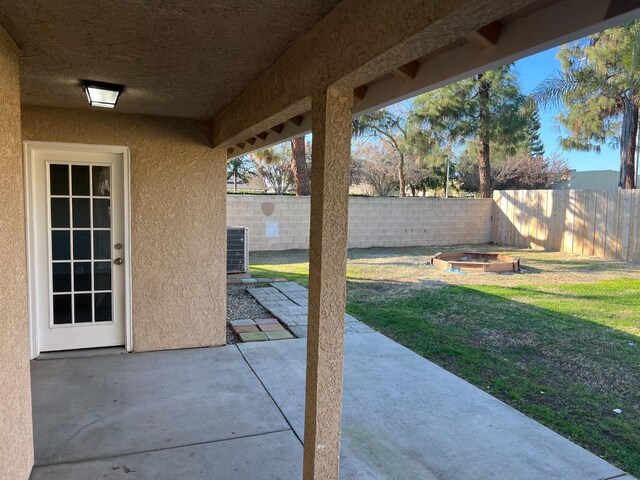 view of patio with cooling unit