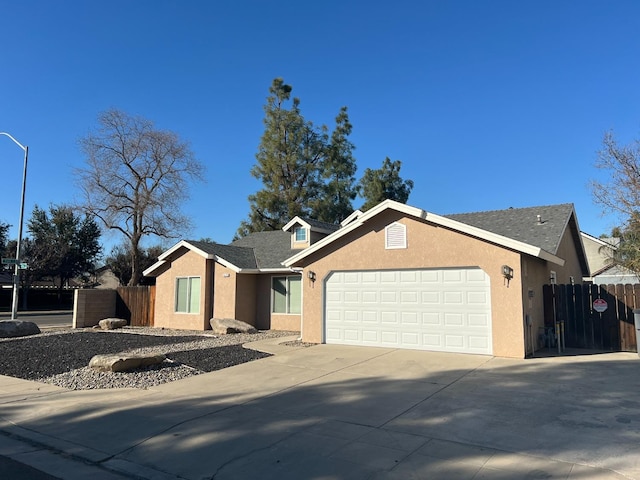 single story home featuring a garage