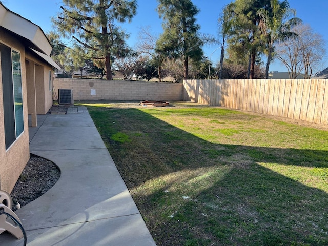 view of yard with central AC unit