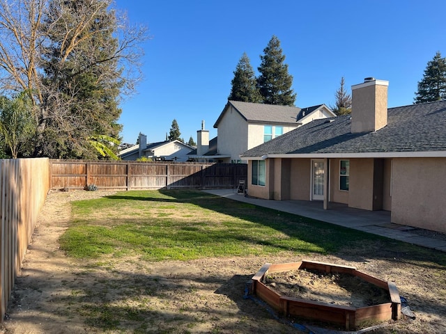 view of yard with a patio area