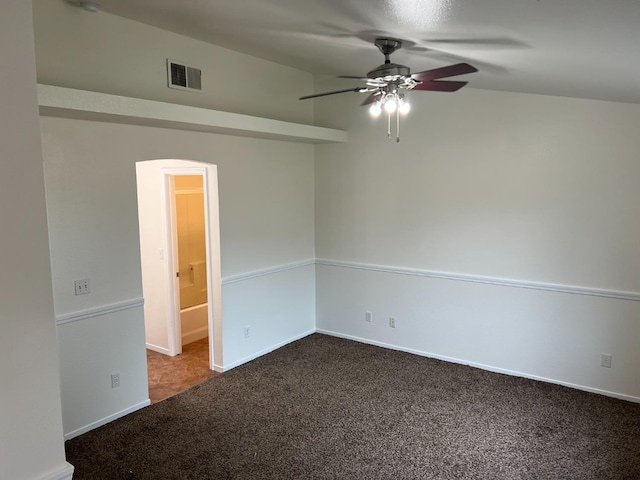 carpeted empty room featuring ceiling fan