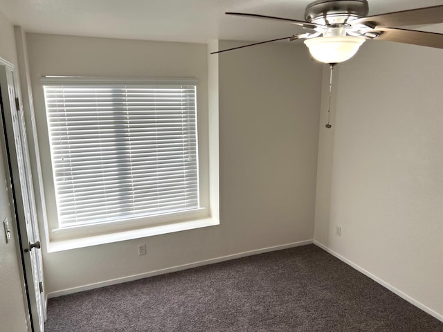 carpeted empty room with ceiling fan