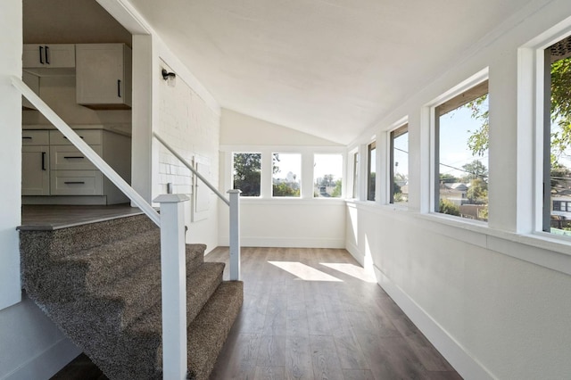 interior space featuring lofted ceiling