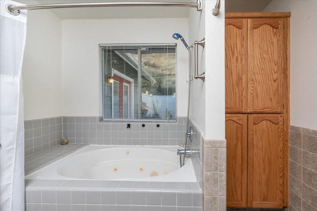 bathroom featuring separate shower and tub and tile walls