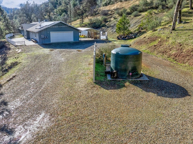 view of front of home featuring a garage and a carport