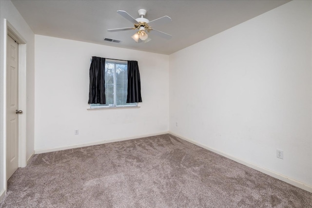 carpeted empty room with ceiling fan