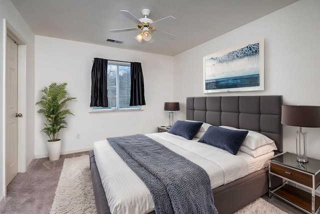 carpeted bedroom featuring ceiling fan