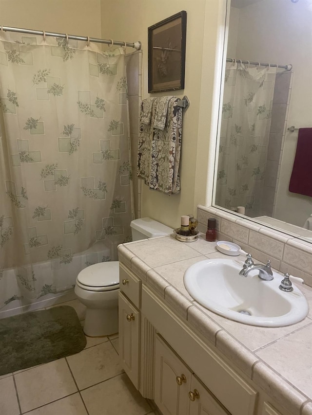 full bathroom with tile patterned flooring, toilet, vanity, and shower / bath combination with curtain