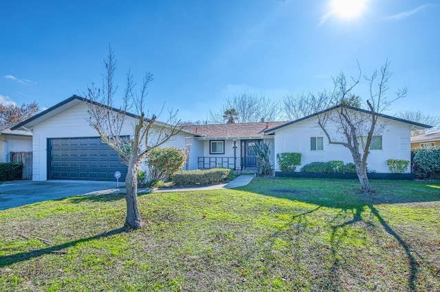 single story home with a front lawn and a garage