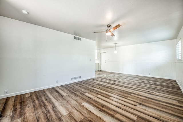 unfurnished room featuring ceiling fan and wood-type flooring