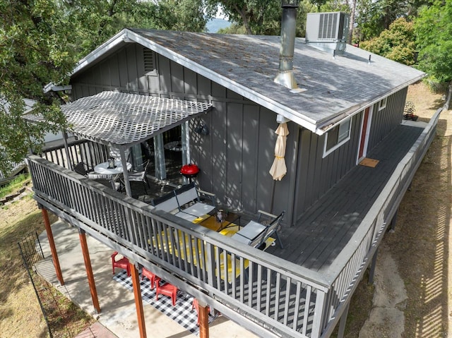 deck featuring central air condition unit