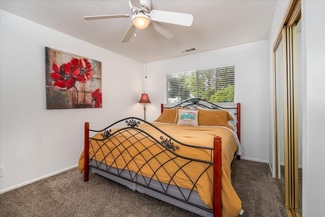 carpeted bedroom with ceiling fan