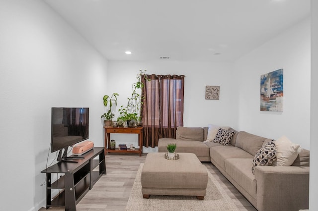 living room featuring light hardwood / wood-style flooring