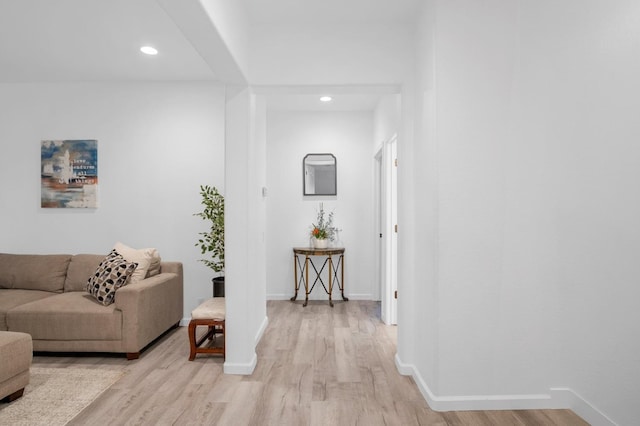 hall with light hardwood / wood-style flooring