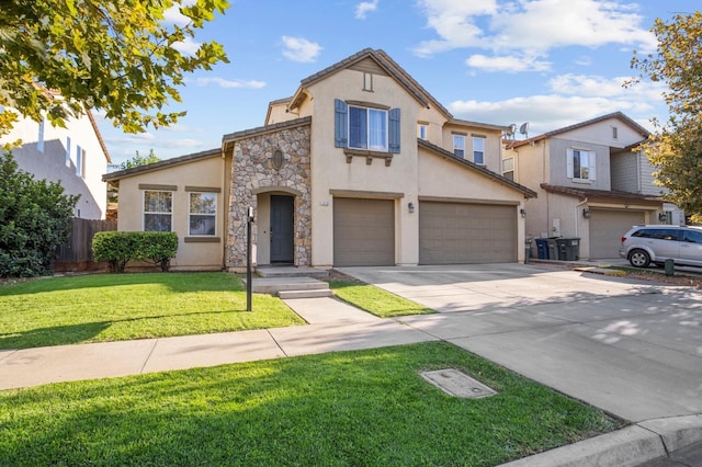 view of front of property with a front yard and a garage