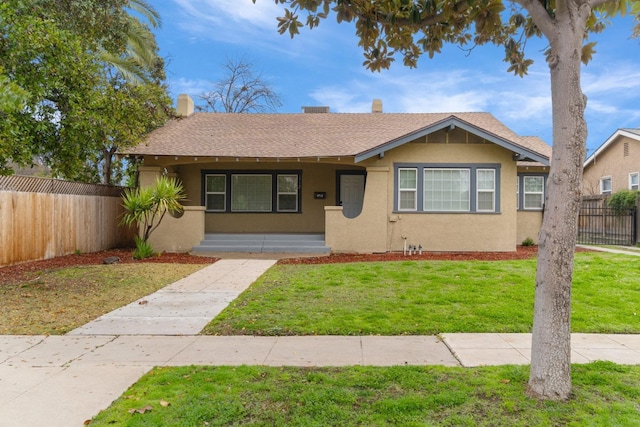 view of front of property with a front lawn