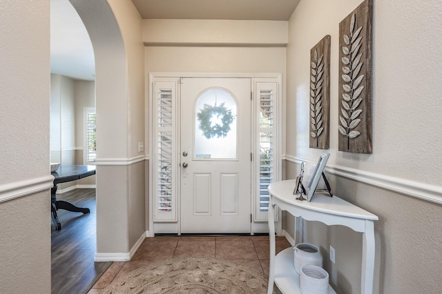 tiled foyer entrance with plenty of natural light