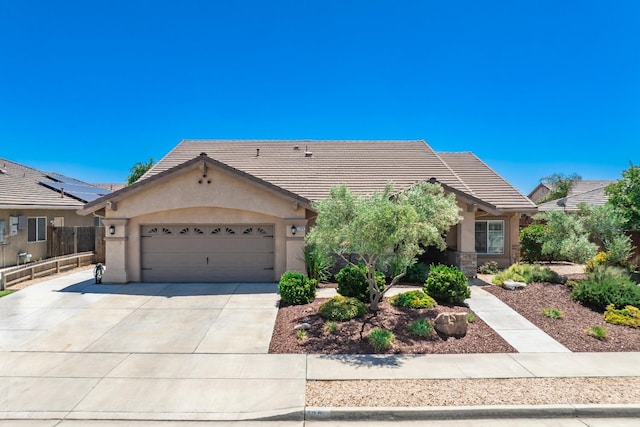 view of front of property featuring a garage