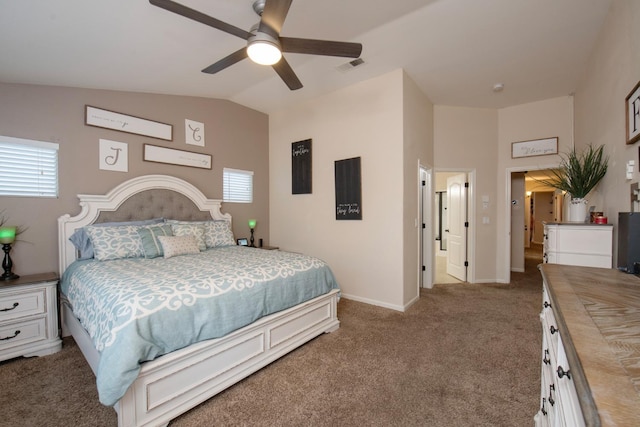 bedroom with vaulted ceiling, carpet flooring, and ceiling fan