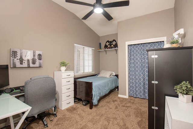 bedroom featuring lofted ceiling, light colored carpet, and ceiling fan