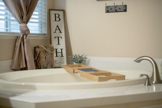 bathroom featuring a bath