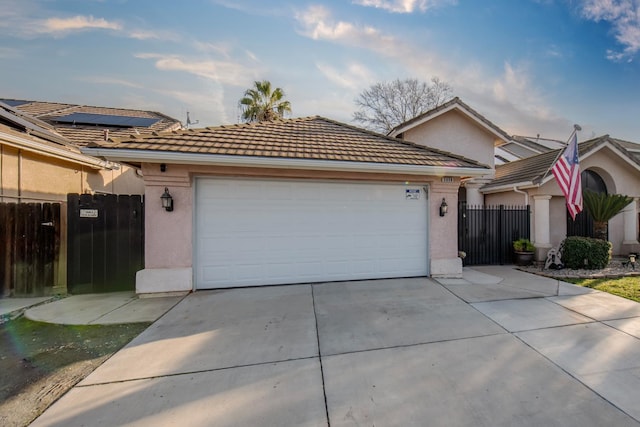 view of front of home with a garage