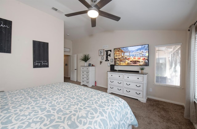 bedroom with ceiling fan, lofted ceiling, and carpet