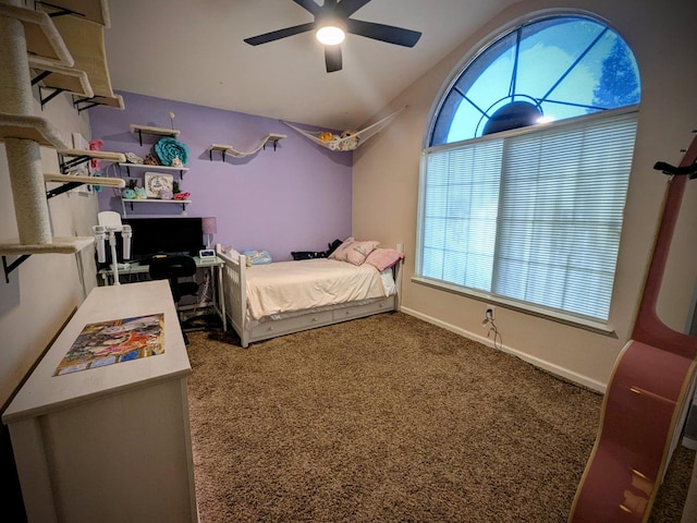 bedroom with ceiling fan and carpet